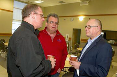 John Harte, financial secretary for Unifor Local 252, Mike Shields, staff rep for Unifor, and Sid Ryan, president, Ontario Federation of Labour, chat prior to a meeting of union executives to discuss strategy for the upcoming provincial election.(Photos by Bryon Johnson)