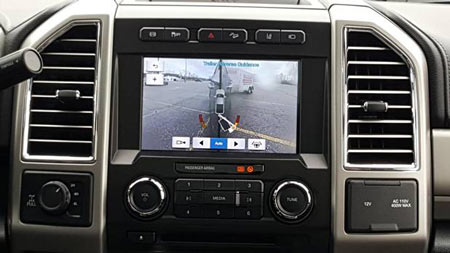 b-	The backup assist technology offers an overhead view