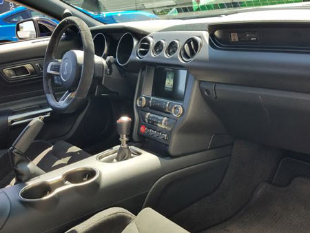 The Ford Mustang Shelby GT350's price jumps $3000 with performance upgrades - as well as interior tweaks like standard wrapped console, 4G WiFi, and SYNC 3 infotainment. (Photo: Henry Payne, The Detroit News)