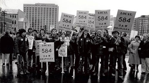 (LtoR) Gary Claxton, Ric Devriese, Tom Spracklin, Dave Corbett, Joco Pike, Frank Marek, Kevin Marek, Ray Hart, Doug Berry, Jordan Bond, Bob Luffman, Ernie Mackay, Carlos, Owen Mortimer,Norm Richards and Arnold Van Beurden & Wife - (Photo by Chris Wilski) November 21, 1981